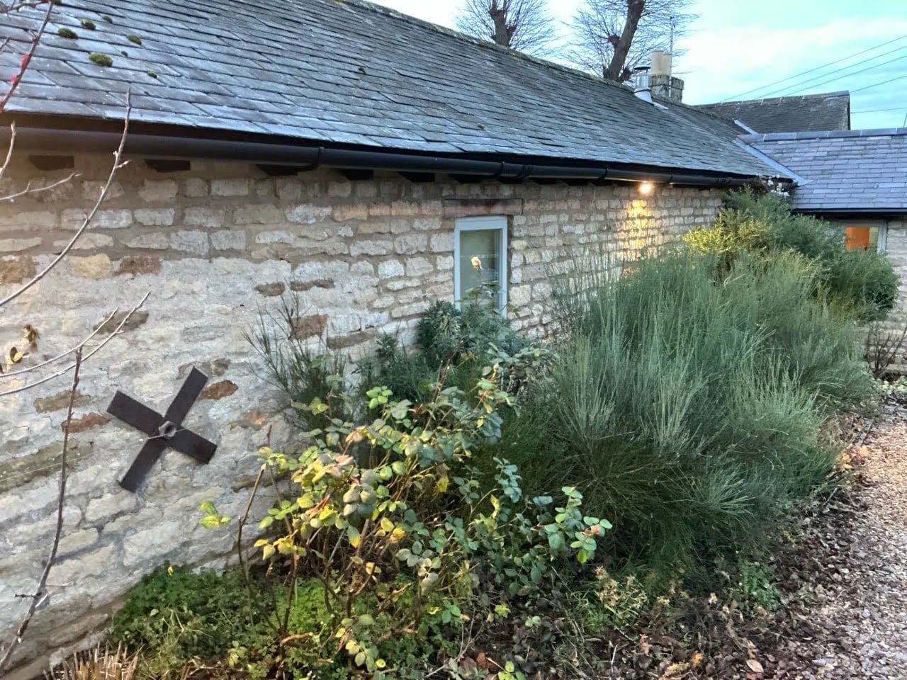 Pattress plate installed to repair a bowing wall near Brackley