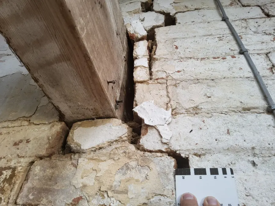 Structural wall crack being investigated by Simplify Structures structural engineer